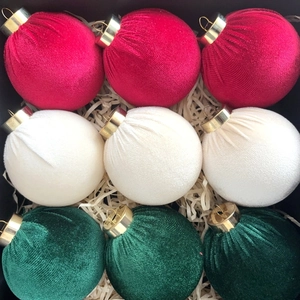 Set of 9 red white and green velvet Christmas ornaments in a gift box with golden caps