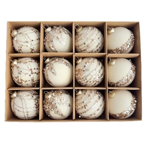 12-piece white frosted Christmas balls with gold stars in a kraft box packaging