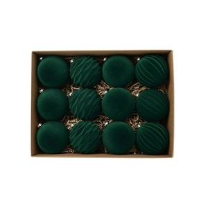 Close-up of twelve dark green flocked Christmas balls in a recycled kraft paper gift box