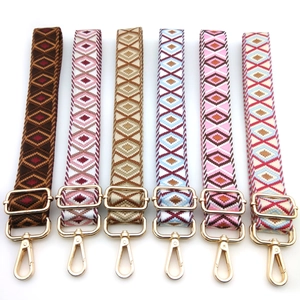 Adjustable geometric diamond weave shoulder strap with gold metal hardware for handbags