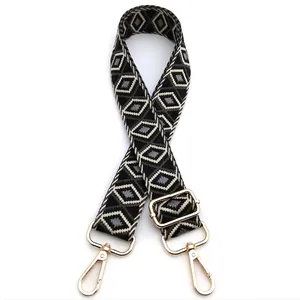 Adjustable black and white geometric diamond weave strap with gold swivel lobster clasps