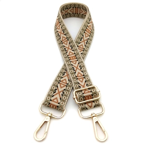 Ethnic bohemian geometric jacquard bag strap with gold metal buckles on white background