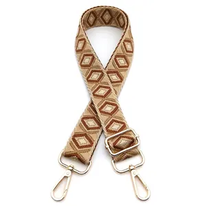 Detail of vintage geometric diamond pattern replacement strap with gold metal lobster clasps