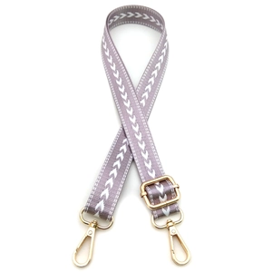 Adjustable lavender strap with white arrow pattern and golden metal swivel clasps