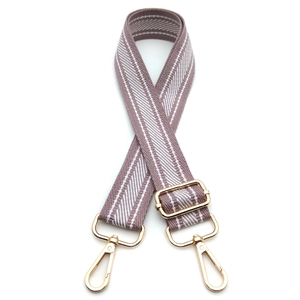 Close-up of adjustable woven shoulder strap in grey-purple with gold metal lobster clasps
