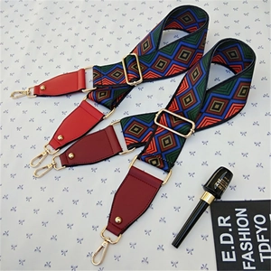 Detail of adjustable colorful wide jacquard shoulder straps with gold metal clips
