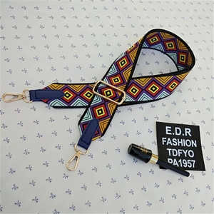 Detail of adjustable bohemian wide shoulder strap with ethnic geometric patterns