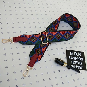 Adjustable wide bag strap with ethnic geometric patterns and gold lobster clasps