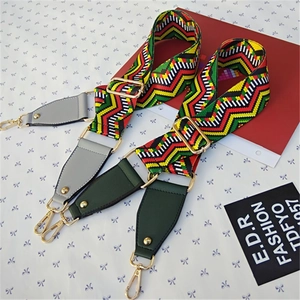Ethnic bohemian style woven adjustable shoulder strap with gold metal hooks and leather ends