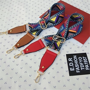 Adjustable ethnic style crossbody strap with geometric patterns and gold metal buckles