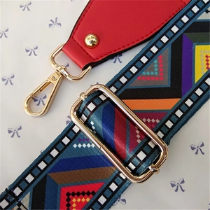 Adjustable colorful geometric patterned crossbody bag strap with red leather ends