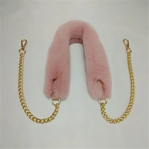 Pink faux fur wide shoulder strap with gold chains and secure lobster clasps detail