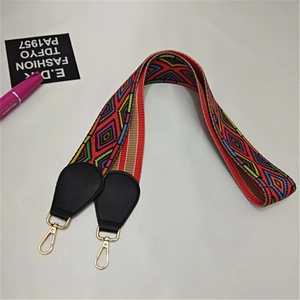 Ethnic style wide bag strap with colorful geometric weave and gold swivel clasps