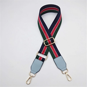 Bandoulière réglable avec rayures rouges et vertes et mousquetons dorés