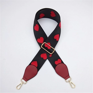 Adjustable wide replacement strap with red heart embroidery and gold metal hardware