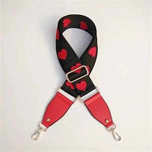Adjustable black wide shoulder strap with red heart embroidery and gold metal hooks