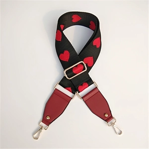 Adjustable wide replacement bag strap with red embroidered hearts and gold lobster clasps