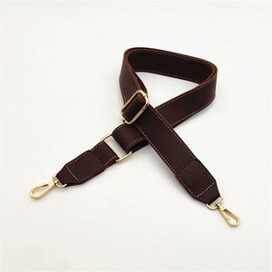 Adjustable dark brown PU leather shoulder strap with gold hooks and white stitching