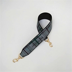 Green, black, and white plaid patterned wide replacement shoulder strap with gold buckles