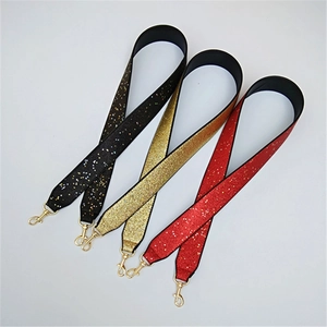 Wide glitter strap replacements for crossbody bags in black, gold, and red colors