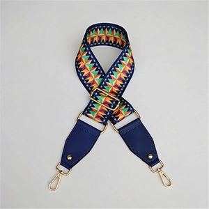 Ethnic wide adjustable bag strap with colorful geometric patterns and gold metal clips