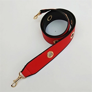 Red PU leather wide shoulder strap with golden metal eyelets and rotating swivel hooks