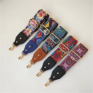Five assorted ethnic style wide adjustable shoulder straps with gold hooks for handbags