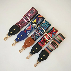 Adjustable wide woven guitar-style shoulder straps with gold hardware for handbags
