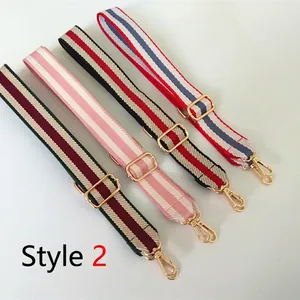 Adjustable striped canvas shoulder straps with gold metal hooks for crossbody bags