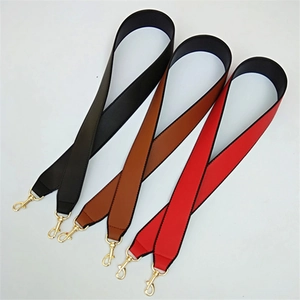 Tracolle larghe in ecopelle nei colori nero, marrone e rosso con fibbie in metallo oro