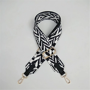 Ethnic style black and white geometric wide bag strap with adjustable gold metal hardware