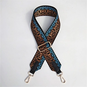 Adjustable wide replacement bag strap with ethnic geometric pattern and gold hardware