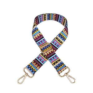Bohemian style colorful geometric patterned bag strap with golden metal hardware