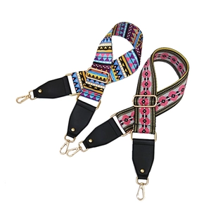 Adjustable wide ethnic style handbag straps with colorful patterns and gold hooks