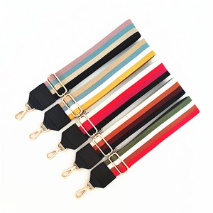 Bandoulières larges ajustables en tissu rayé avec embouts cuir et boucles dorées