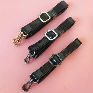 Adjustable black patent leather bag straps with gold, silver and gunmetal hooks