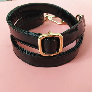 Adjustable black patent PU leather handbag strap with polished gold-tone metal buckles