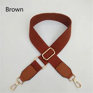Adjustable brown canvas replacement strap for shoulder bags with gold metal hooks