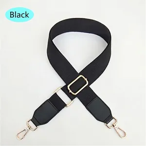 Adjustable black canvas replacement shoulder strap with durable gold metal buckles