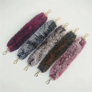 Detailed view of plush faux fur replacement bag straps in five assorted autumn colors