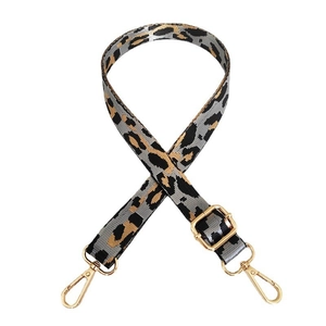 Adjustable crossbody bag strap featuring leopard print jacquard and gold metal hooks
