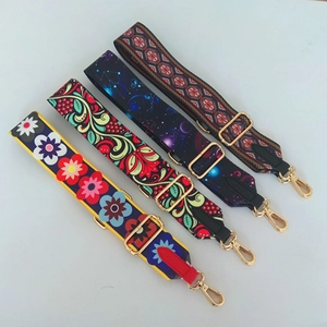 Adjustable wide replacement bag straps in four vibrant patterns with gold metal hardware