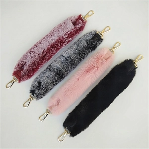 Close-up of fluffy faux fur replacement straps in four colors with gold metal lobster clasps