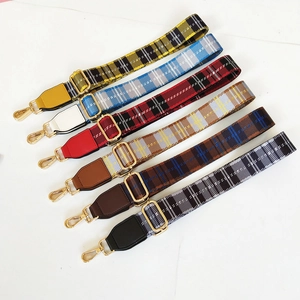 Adjustable plaid handbag straps with gold hardware in six vibrant color options