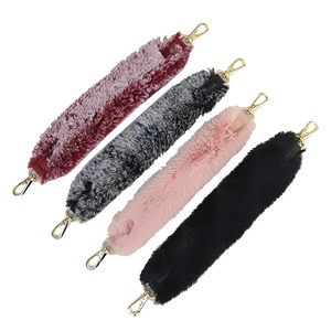 Faux fur handbag straps with gold metal clips in burgundy, grey, pink, and black