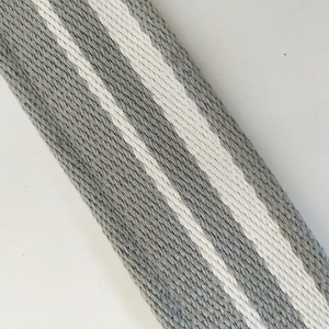 Macro shot of 5cm wide gray and white striped woven shoulder strap texture detail