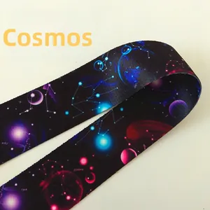 Detail of adjustable nylon strap featuring colorful galaxy and universe star patterns