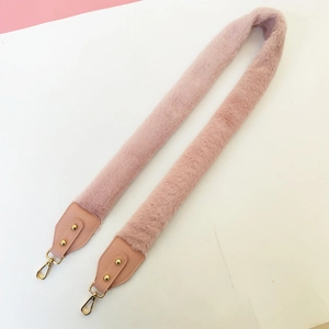Plush faux fur shoulder strap in light pink with golden metal lobster clasps for handbags