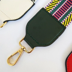 Ethnic style colorful striped embroidered bag strap with gold lobster clasps and green leather