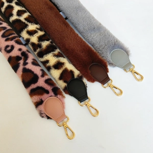 Plush leopard print and solid faux fur wide shoulder straps with metal lobster clasps